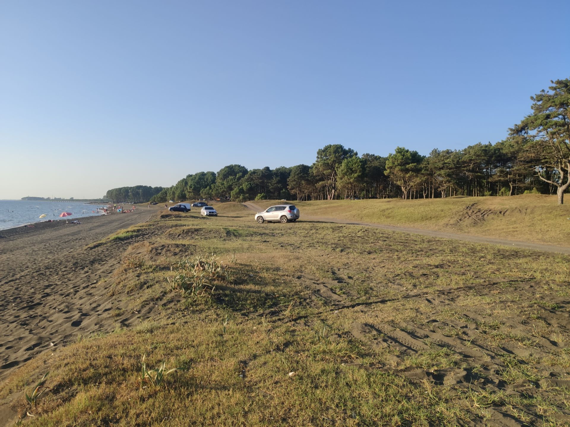 Foto von Ureki Nature beach mit lange, gerade küste