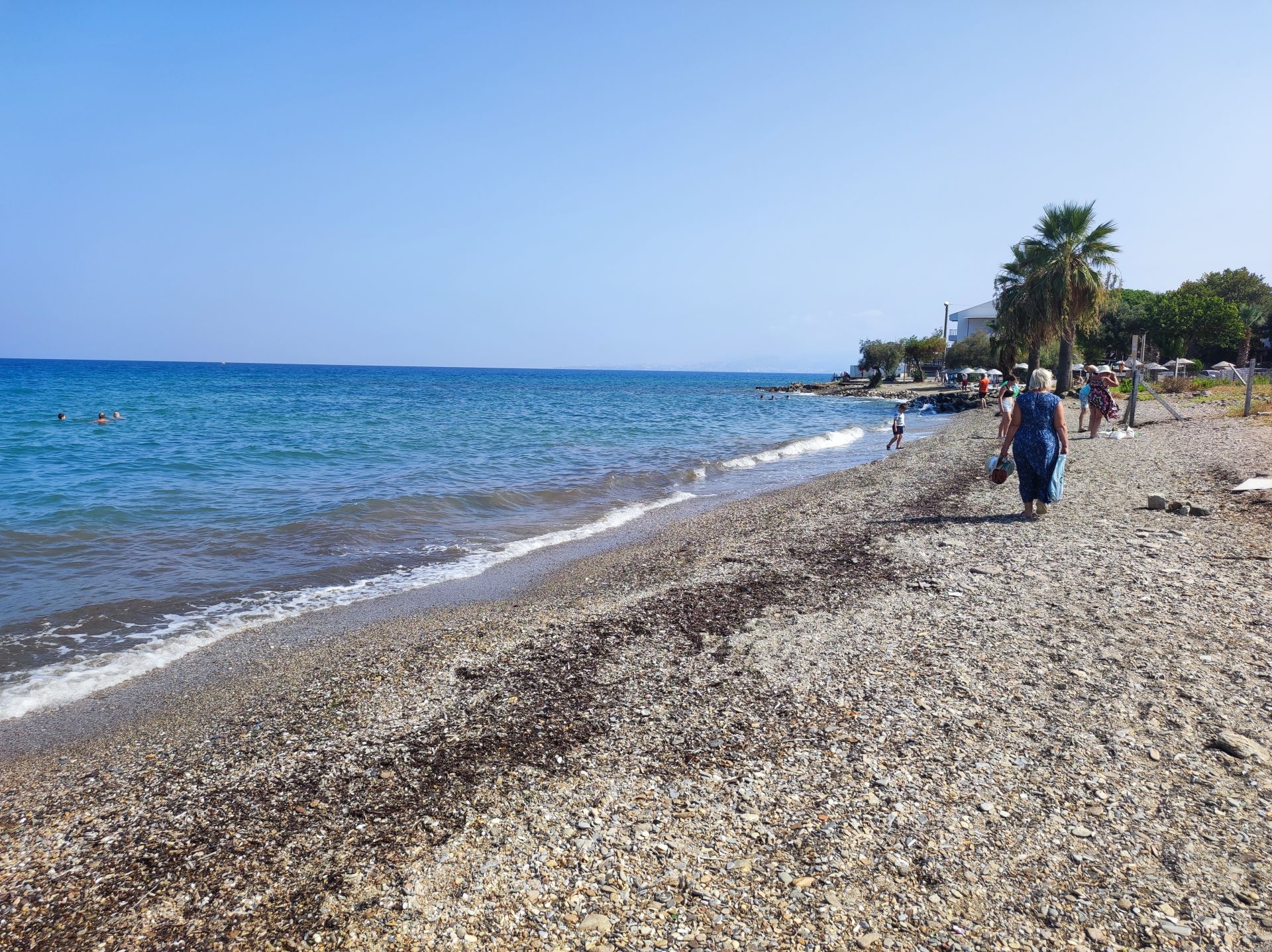 Foto von Guzelcamli beach und die siedlung