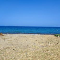 Foto von Guzelcamli beach mit türkisfarbenes wasser Oberfläche