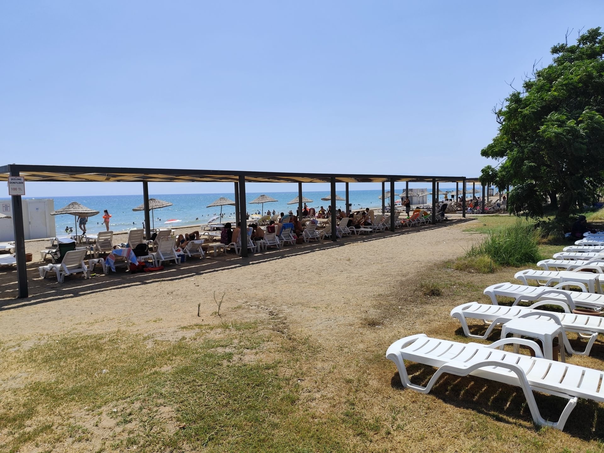 Foto von Belek Public beach mit brauner sand Oberfläche