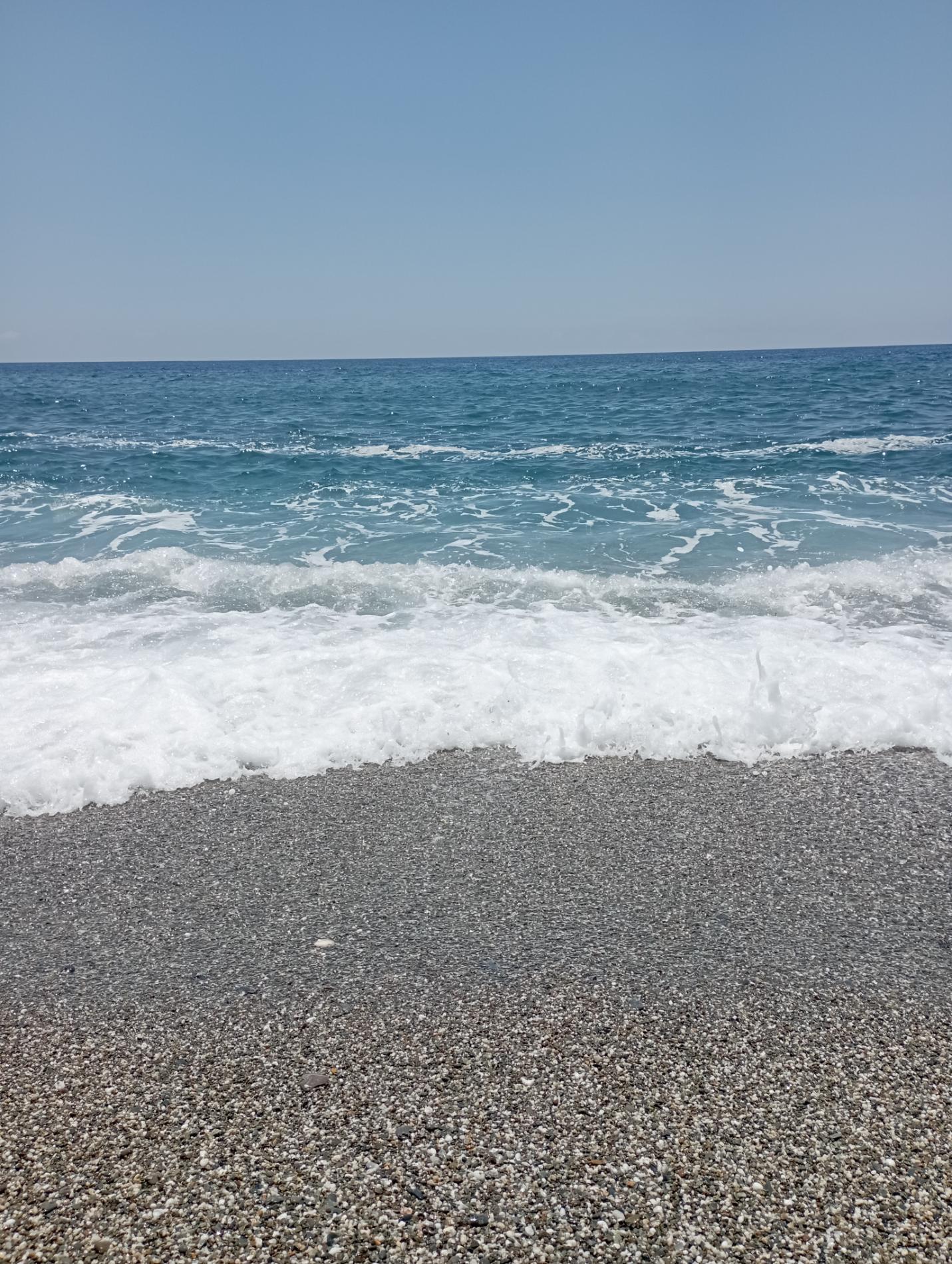 Foto von Macar beach mit geräumige küstenlinie